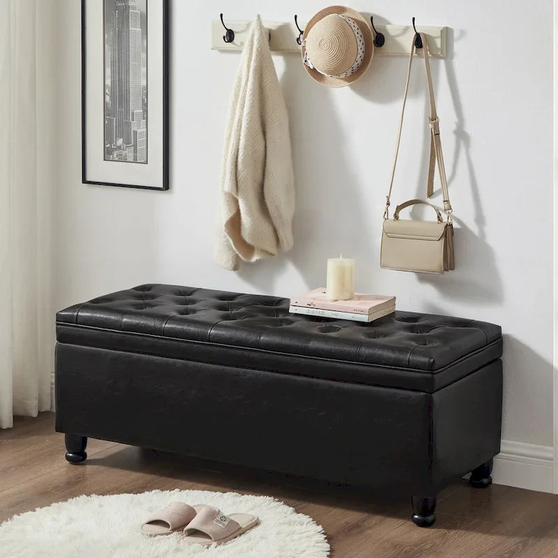 Panca contenitore nera imbottita e trapuntata con bottoni, in finta pelle e gambe in legno tornite, panca pouf contenitore